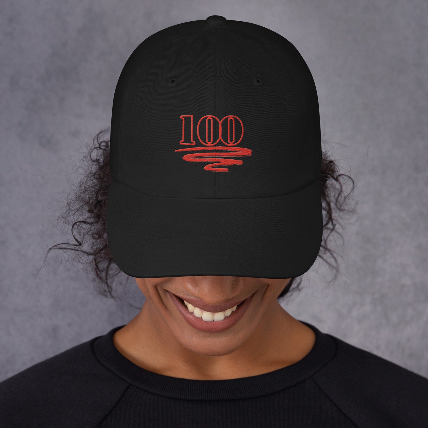 "Model wearing the Century Cap showing front design"