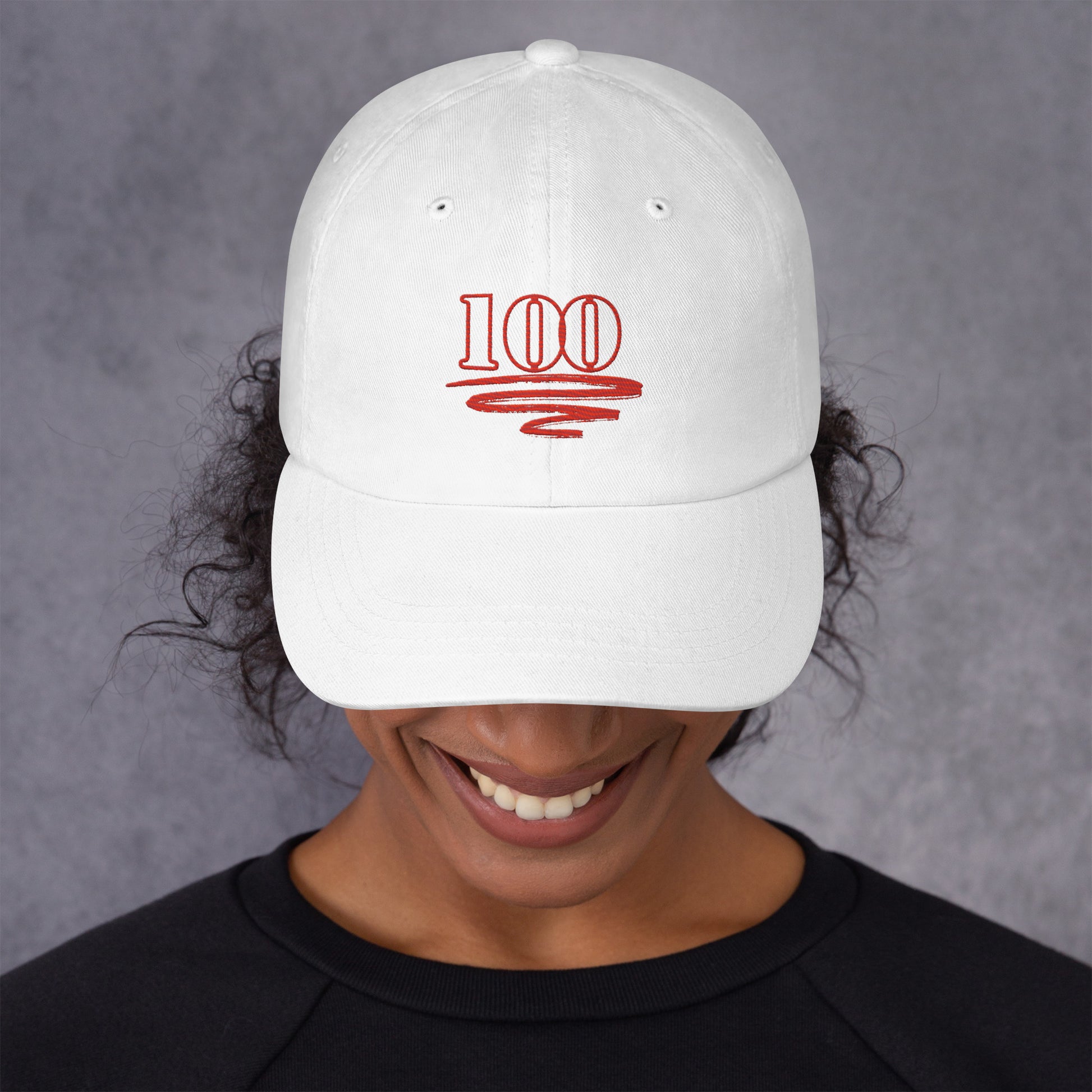 "Model wearing the Century Cap showing front design in white"